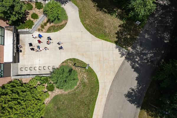 Aerial view of group walking on campus